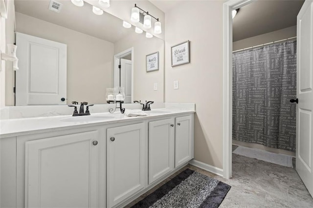 bathroom featuring vanity