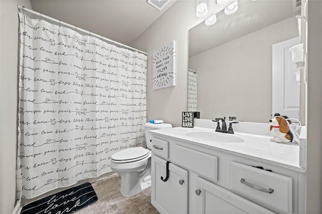 bathroom featuring tile patterned floors, vanity, toilet, and a shower with curtain