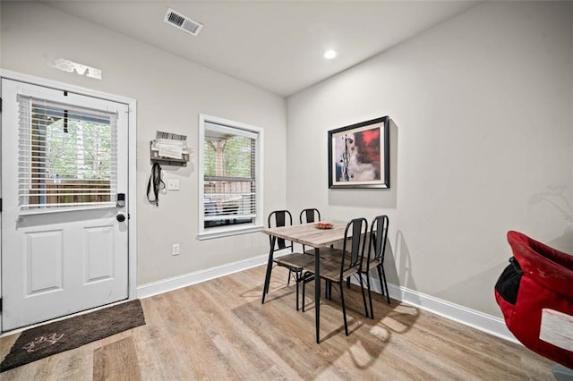 dining space featuring light hardwood / wood-style floors