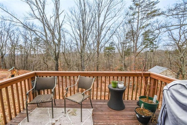 wooden deck with grilling area