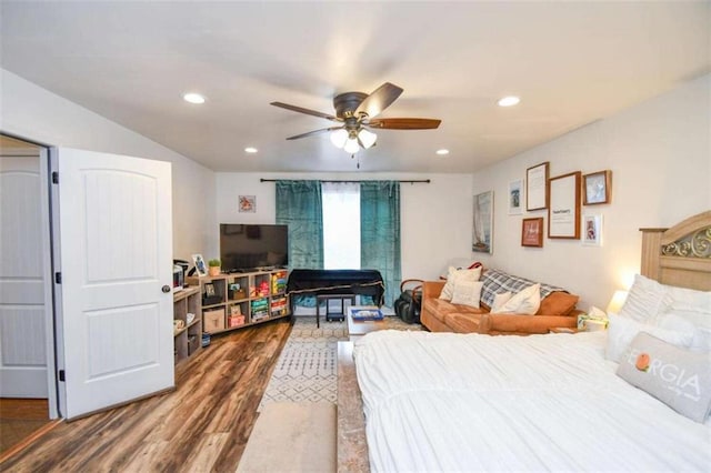 bedroom featuring wood-type flooring and ceiling fan