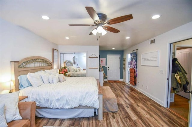 bedroom featuring ceiling fan and wood-type flooring