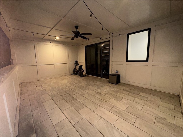 basement featuring ceiling fan