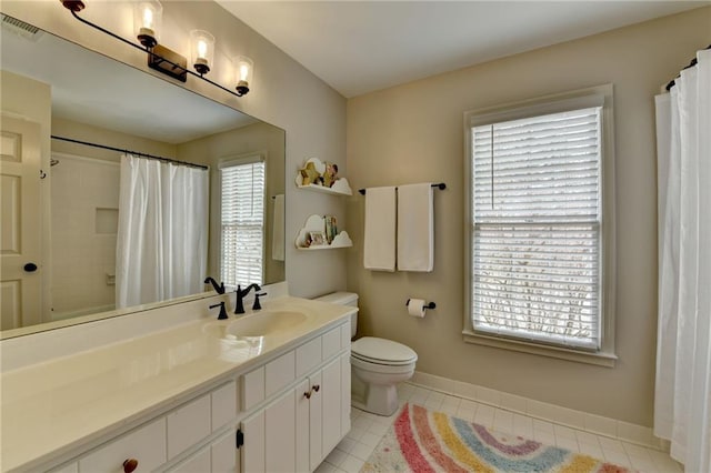 full bath with baseboards, tile patterned flooring, toilet, vanity, and a shower with curtain