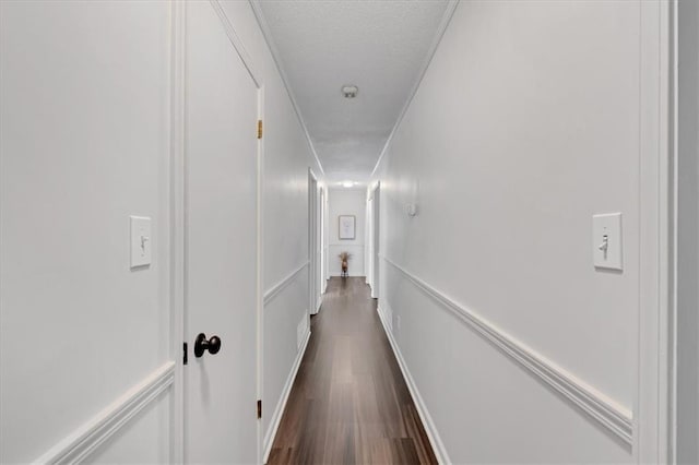 hall featuring dark hardwood / wood-style floors