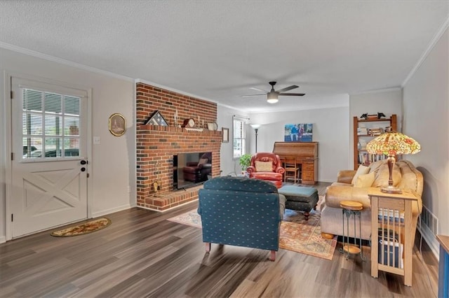 living room featuring crown molding, a wealth of natural light, and dark hardwood / wood-style flooring