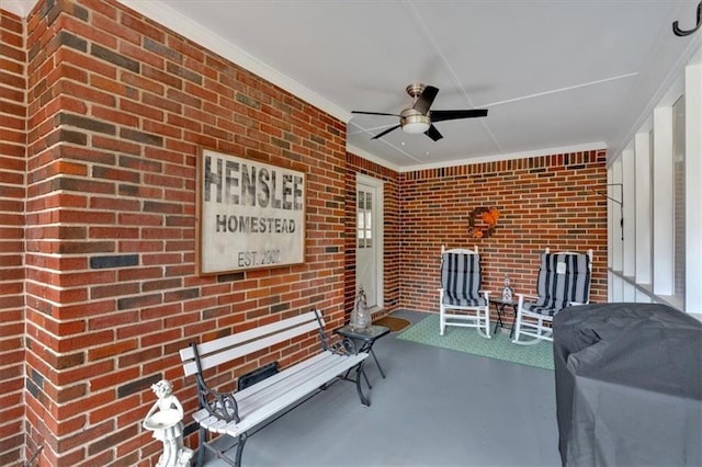 view of patio / terrace with area for grilling and ceiling fan