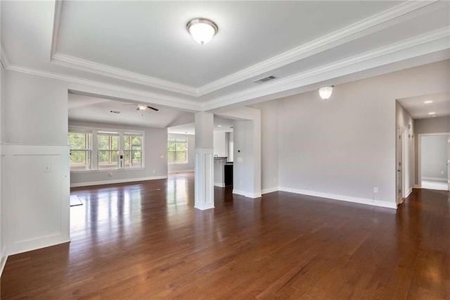 1374 Highland Wood Ct, Auburn, GA 30011 - unfurnished living room with dark wood-style flooring, ceiling fan, crown molding, a raised ceiling, and baseboards