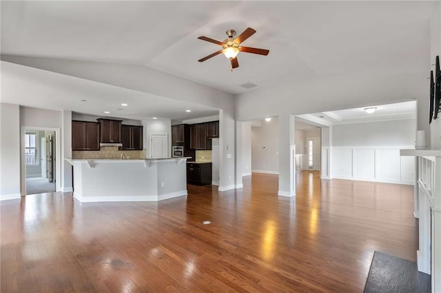 1374 Highland Wood Ct, Auburn, GA 30011 - unfurnished living room with ceiling fan, lofted ceiling, wood finished floors, and recessed lighting