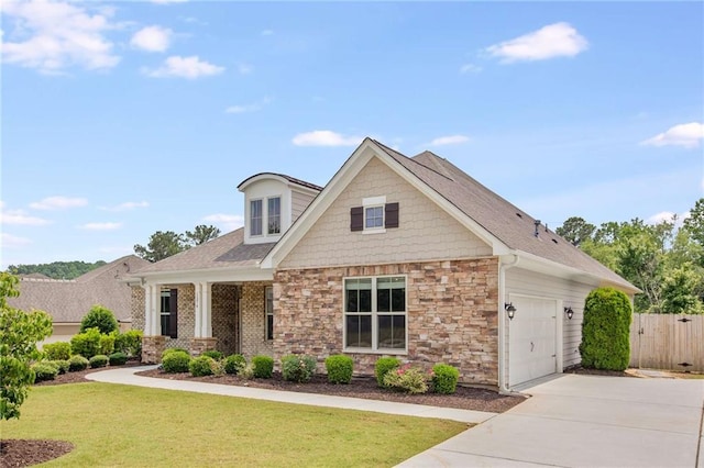 1374 Highland Wood Ct, Auburn, GA 30011 - craftsman house featuring driveway, stone siding, a garage, and a shingled roof