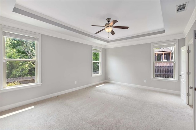 1374 Highland Wood Ct, Auburn, GA 30011 - spare room with a raised ceiling, light carpet, ceiling fan, baseboards, and ornamental molding
