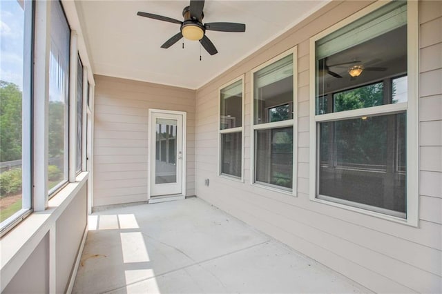 1374 Highland Wood Ct, Auburn, GA 30011 - unfurnished sunroom with ceiling fan