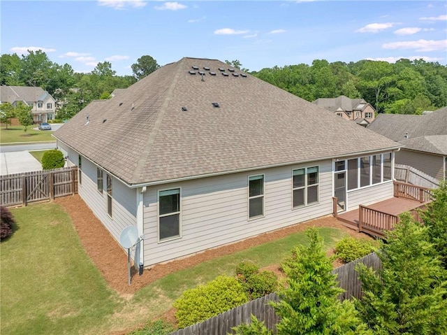 1374 Highland Wood Ct, Auburn, GA 30011 - rear view of house with roof with shingles, a wooden deck, and a sunroom