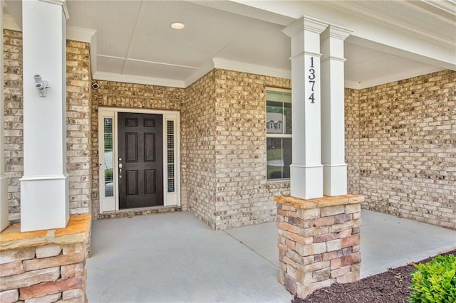 1374 Highland Wood Ct, Auburn, GA 30011 - property entrance featuring covered porch and brick siding