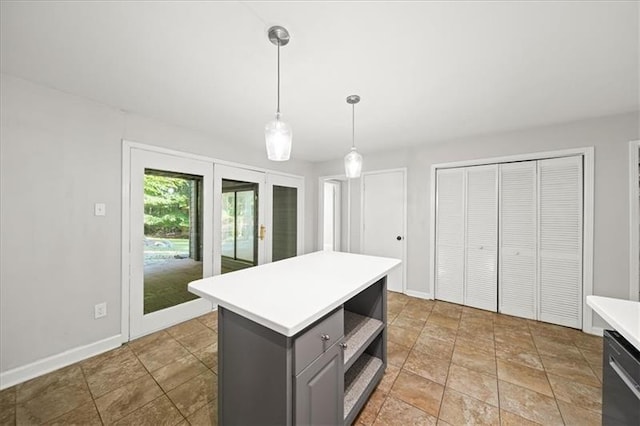 kitchen with french doors, gray cabinetry, a center island, dishwasher, and pendant lighting