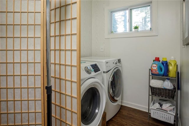 washroom featuring independent washer and dryer and dark hardwood / wood-style floors