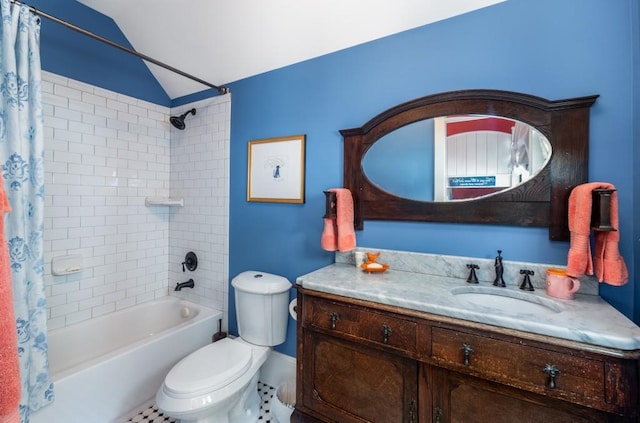 full bathroom featuring toilet, tile patterned floors, vanity, shower / bath combo, and vaulted ceiling