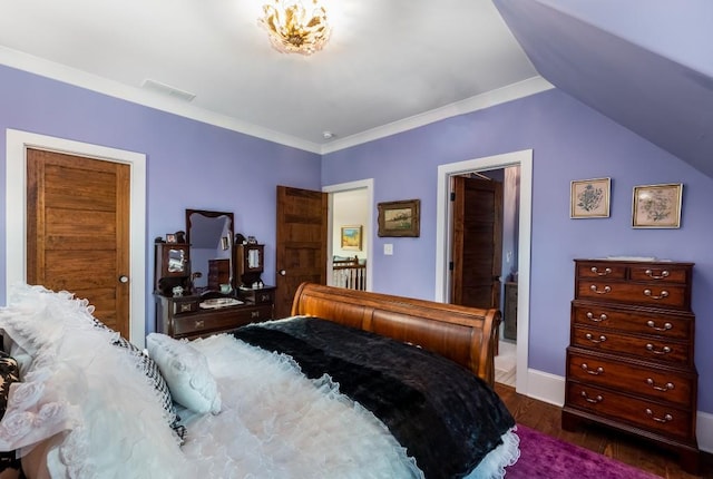 bedroom featuring ornamental molding, dark hardwood / wood-style flooring, and vaulted ceiling