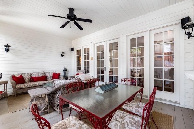 sunroom / solarium with french doors, ceiling fan, and wood ceiling