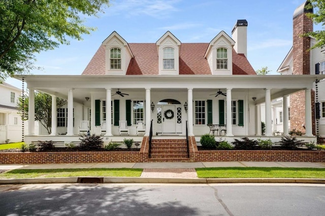 view of front of house with a porch and ceiling fan