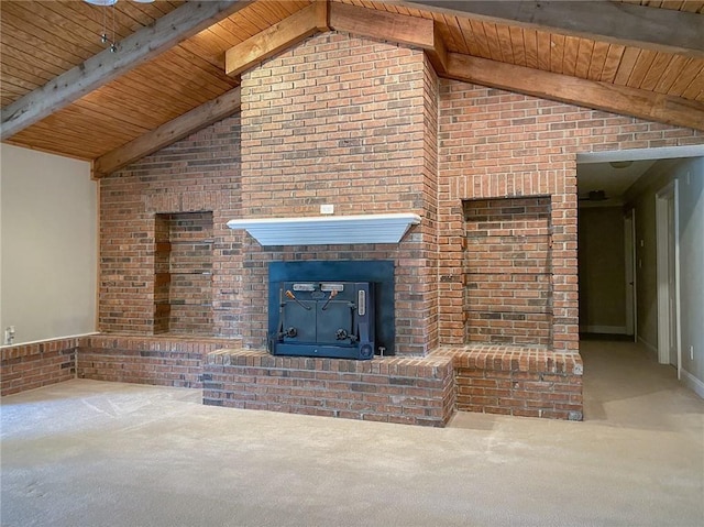 unfurnished living room with a wood stove, wooden ceiling, lofted ceiling with beams, brick wall, and carpet floors