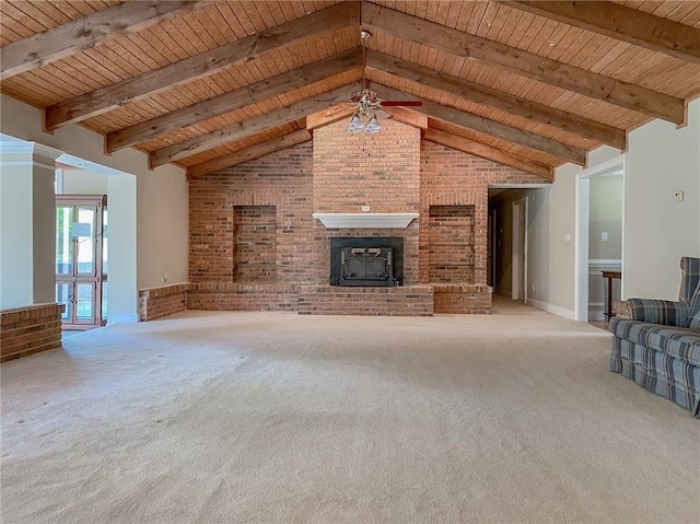 unfurnished living room featuring carpet flooring, wood ceiling, brick wall, ceiling fan, and a fireplace