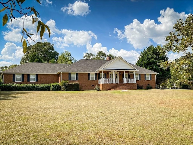 view of front facade featuring a porch and a front yard