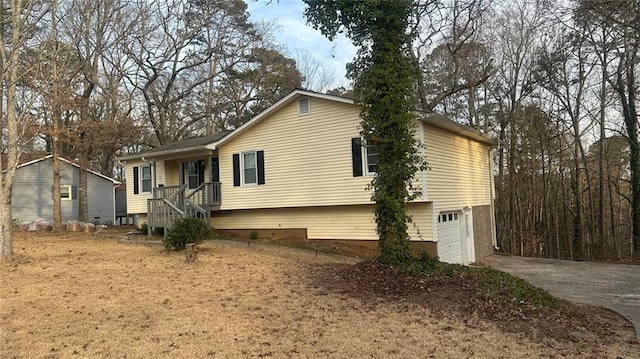 view of home's exterior featuring a garage