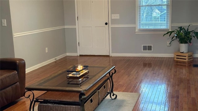 living area with dark wood-type flooring