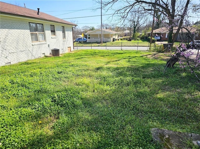 view of yard featuring central AC unit