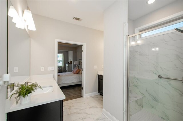 bathroom with vanity and walk in shower