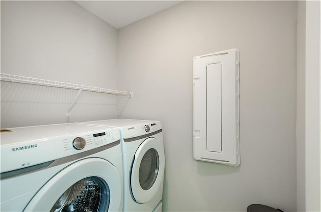 laundry area with washer and clothes dryer