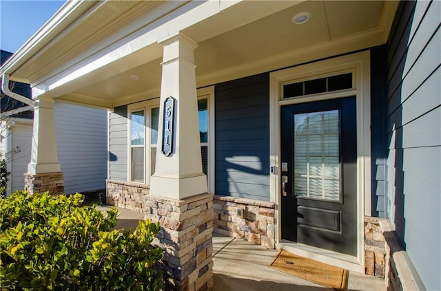 entrance to property with a porch