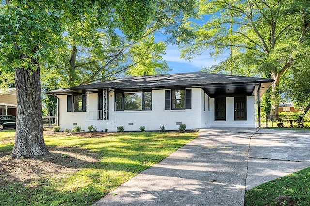 1207 Ellington Dr, Morrow, GA 30260 - view of front of home featuring crawl space, concrete driveway, a front yard, and brick siding