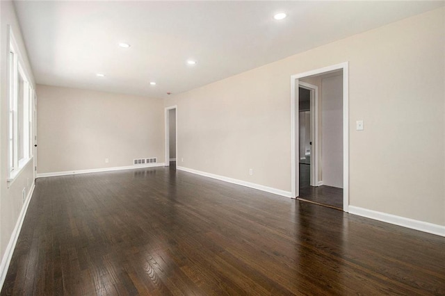 1207 Ellington Dr, Morrow, GA 30260 - spare room featuring dark wood-style flooring, baseboards, and recessed lighting