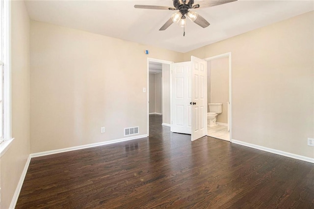 1207 Ellington Dr, Morrow, GA 30260 - empty room featuring ceiling fan, baseboards, and dark wood-style floors
