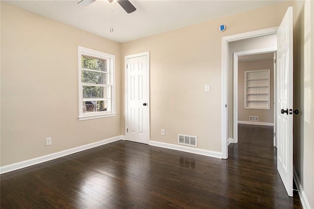 1207 Ellington Dr, Morrow, GA 30260 - unfurnished room with ceiling fan, dark wood-type flooring, and baseboards
