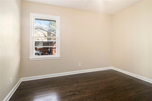 1207 Ellington Dr, Morrow, GA 30260 - empty room with dark wood-type flooring and baseboards