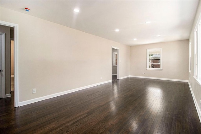 1207 Ellington Dr, Morrow, GA 30260 - unfurnished room featuring dark wood-style floors, baseboards, and recessed lighting
