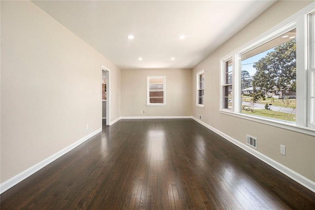 1207 Ellington Dr, Morrow, GA 30260 - empty room with dark wood-style floors, baseboards, and recessed lighting