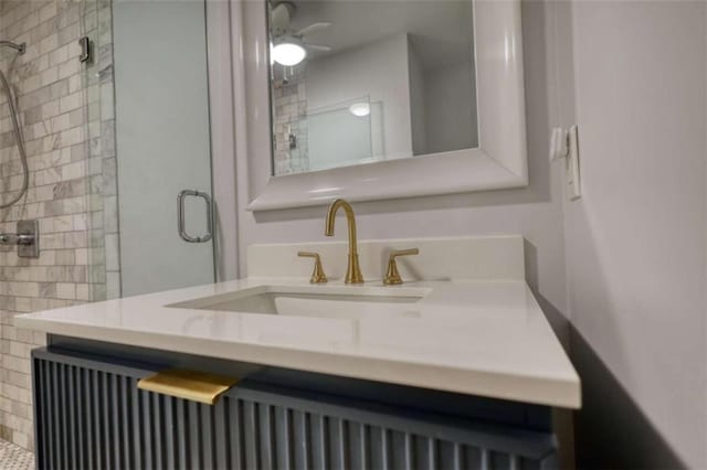 bathroom featuring a stall shower, vanity, and radiator