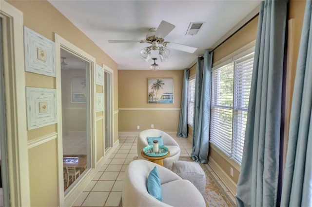 balcony featuring ceiling fan