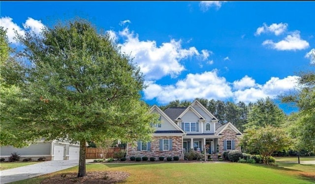 1105 Harperfield Dr, Bogart, GA 30622 - view of front facade with a front lawn, concrete driveway, and stone siding
