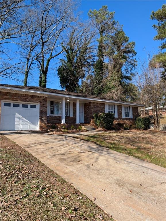 ranch-style home with a garage