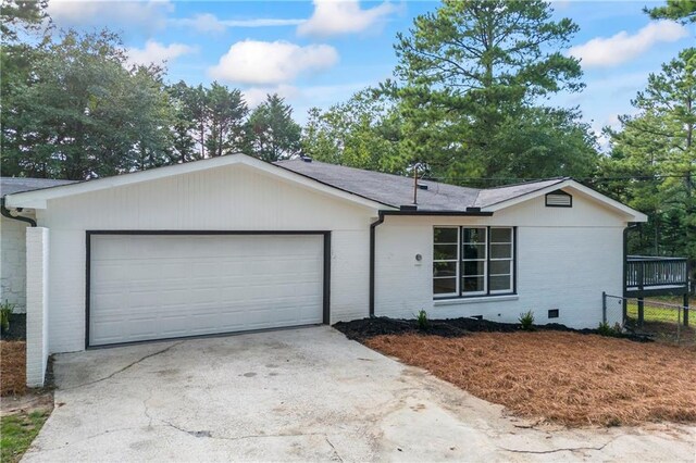 ranch-style house with a garage