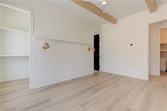 789 Old Mill Ct, Ball Ground, GA 30107 - empty room with beam ceiling, light wood-type flooring, wainscoting, and baseboards