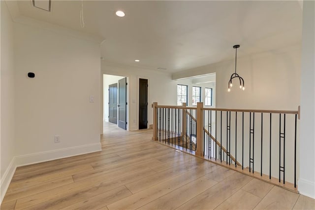 789 Old Mill Ct, Ball Ground, GA 30107 - hallway featuring an upstairs landing, light wood-type flooring, baseboards, recessed lighting, and crown molding