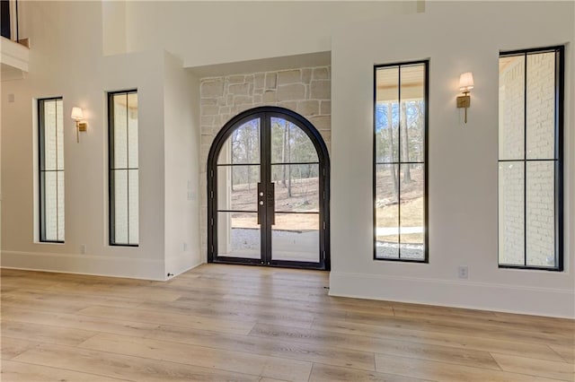 789 Old Mill Ct, Ball Ground, GA 30107 - entryway featuring light wood-style floors, baseboards, and french doors