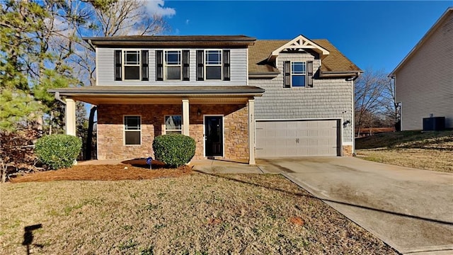 view of front of house featuring covered porch, central AC, and a garage