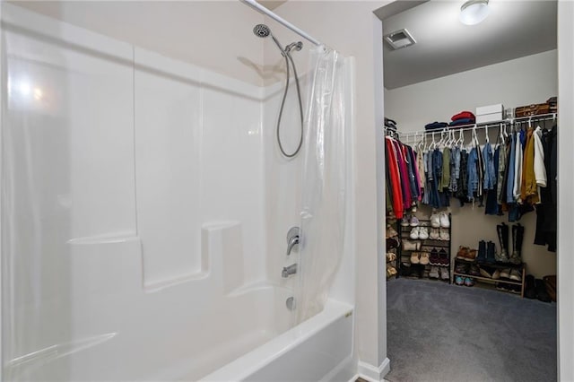 bathroom with shower / bath combo